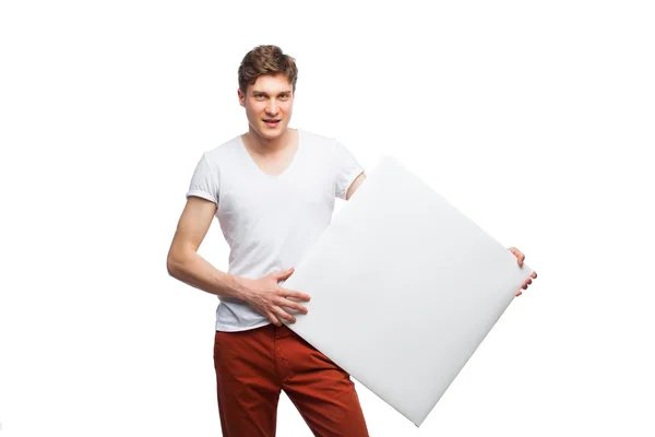 Joven rubia hombre mostrando vacío panel aislado en blanco — Foto de Stock