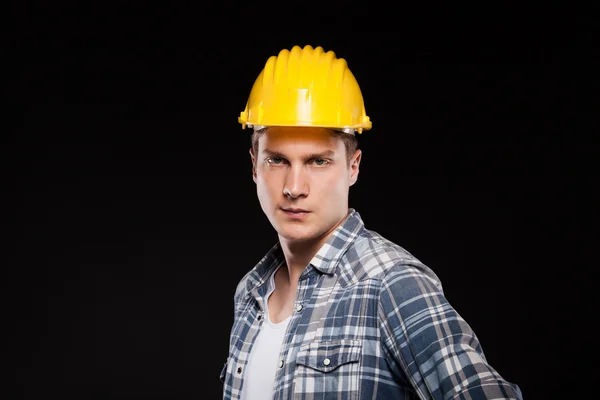 Portrait of a worker with yellow helmet on head — Stock Photo, Image