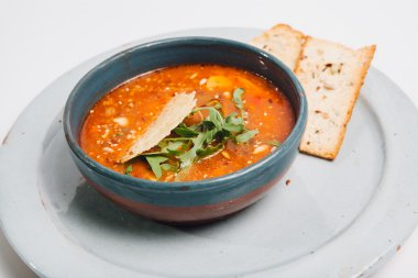 bowl with soup and bred