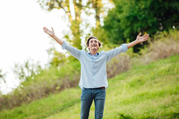 Successful man with open arms celebrating — Stock Photo, Image
