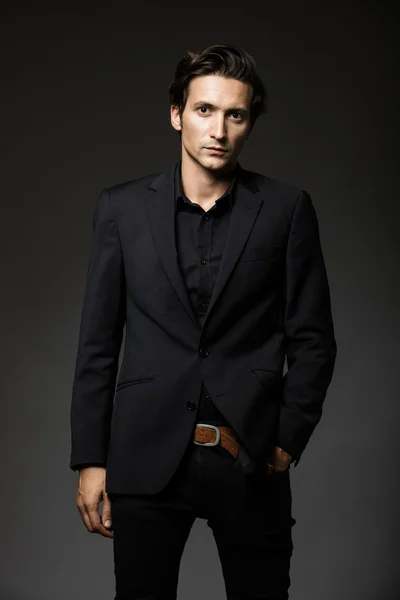 attractive man in black suit