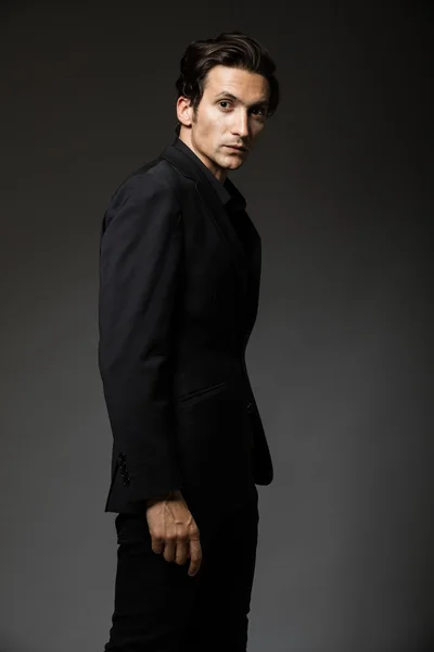 attractive man in black suit