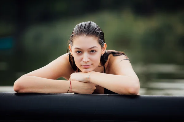 Wet woman in water on paddleboard — Stock Photo, Image