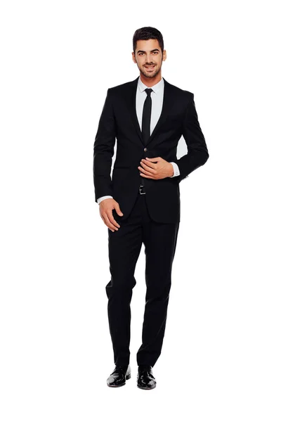 Eleganta mannen i svart kostym, på vitt — Stockfoto