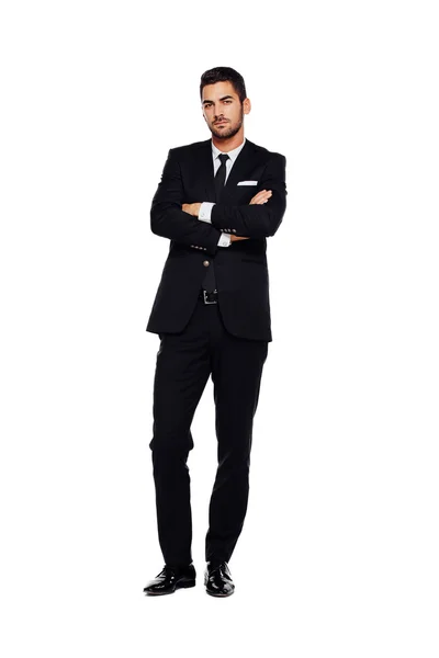 Eleganta mannen i svart kostym, på vitt — Stockfoto