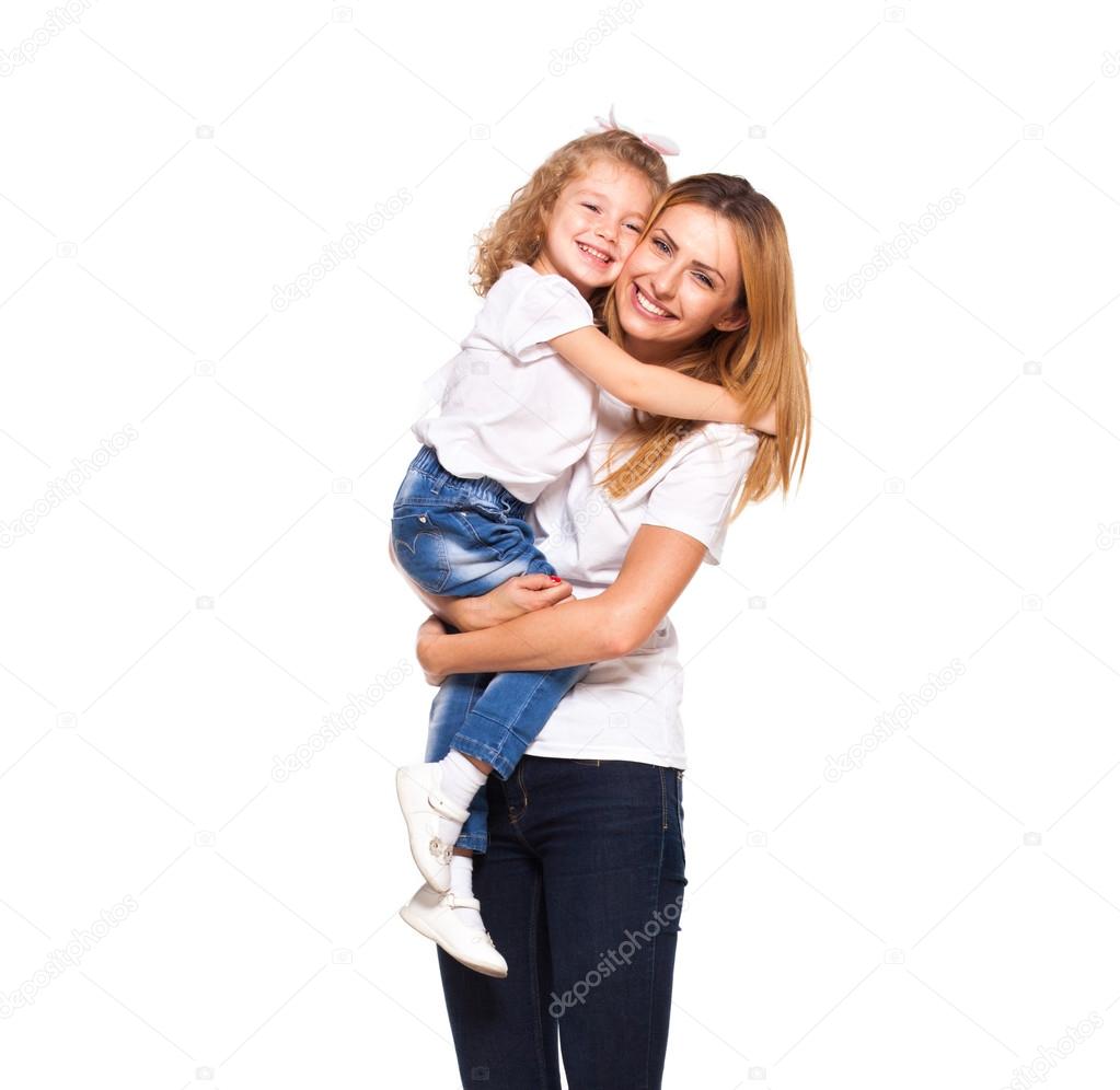 young mother and her little daughter isolated on white