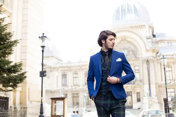 Elegant man in plaid on the street — Stock Photo, Image