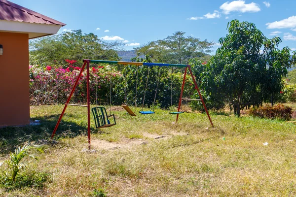 Swings in a graden — Stock Photo, Image