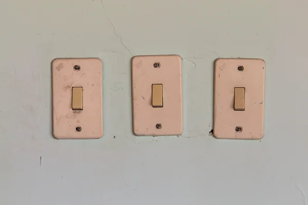 Interruptores en una pared —  Fotos de Stock