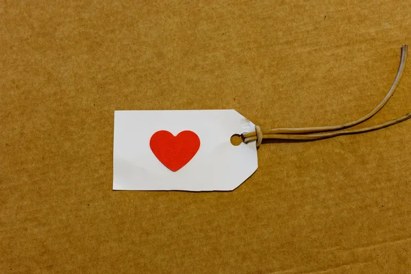 Coração em uma etiqueta branca — Fotografia de Stock