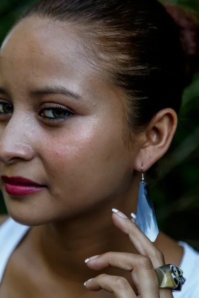 Woman with handmade earring — Stock Photo, Image