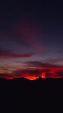 Vertical video. Timelapse of Sunset Slowly Turning Into Darkness Transition to the Unknown Concept