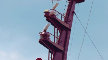 Close View of Ferry Mast Platforms With Navigation Equipment And Signal Lights Highlighting Marine Communication And Ship Control Systems
