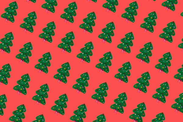 Pastel kırmızı renkte yeşil Noel ağacı deseni. Minimum Noel kompozisyonu. 3 Boyutlu Hazırlama.