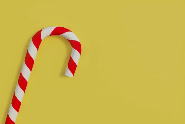 糖果贴在黄色背景和复制空间上的特写 圣诞糖果手杖 白色条纹 圣诞节的象征 新年的概念 3D渲染 — 图库照片