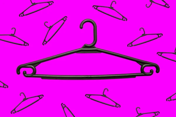 Large Small Plastic Hangers Bright Background Black Clothes Holders Household — Stock Photo, Image