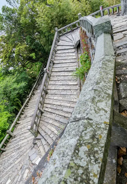 Stone brick ladder walkway on hill