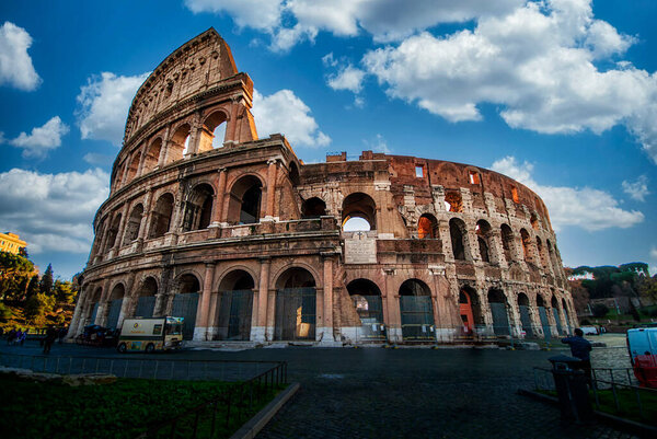 ROME, ITALY - DECEMBER 2011: Colosseum in Rome, Italy. Ancient Roman Colosseum is one of the main tourist attractions in Europe. People visit the famous Colosseum in Roma center.