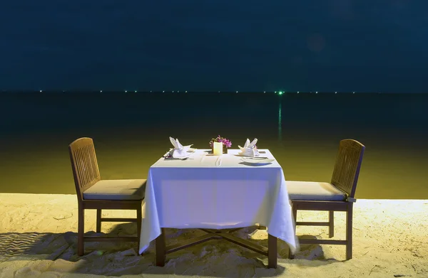 Romantic dinner on the sea beach — Stock Photo, Image