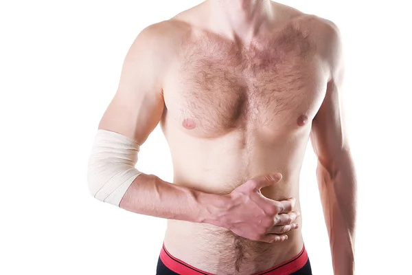 El vendaje elástico a la mano del hombre con la piel ideal. Aislado sobre un fondo blanco —  Fotos de Stock