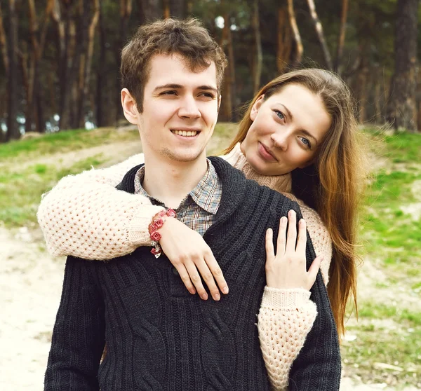 Young couple in love outdoors on a sunny day — Stock Photo, Image