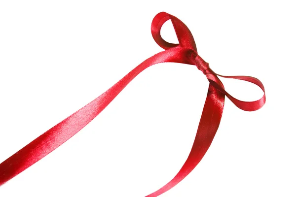 Red fabric ribbon and bow isolated on a white background — Stock Photo, Image