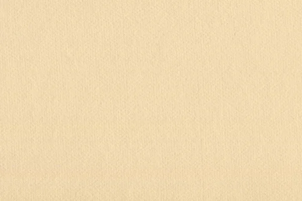 背景としてのベージュのクラフト紙のシート 軽いラフな質感の表面 コピースペースとして有用な段ボールの質感背景 — ストック写真