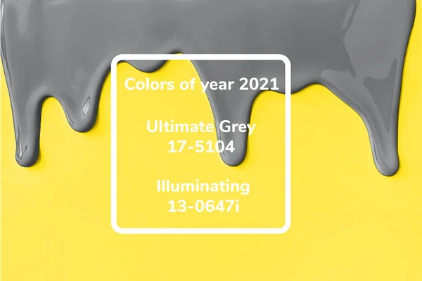 Gray paint leaking down yellow background. Stockfoto