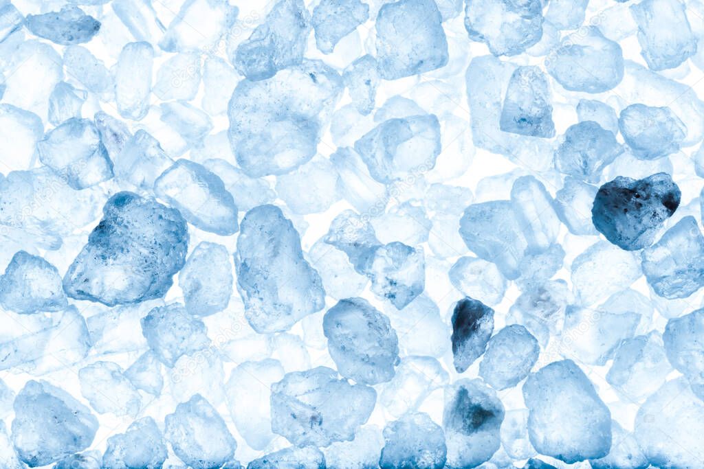 Sea salt crystals on a white background.