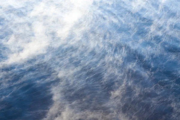 Water vapor on surface of cold water