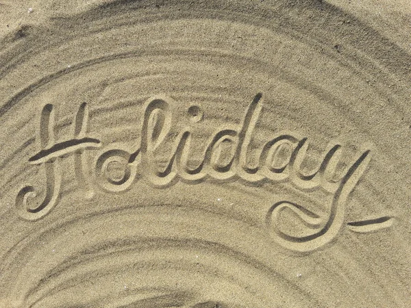 Napisz słowo tekst wakacje na plaży — Zdjęcie stockowe