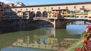FLORENCE, ITALY - NOVEMBER, 2015: The old bridge over the River Arno, tourist place worldwide