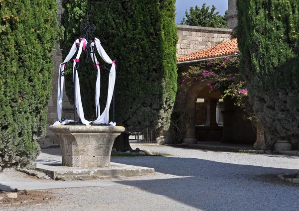 Decorated well at Ialyssos Church — Stock Photo, Image