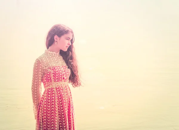 Beautiful girl in the boat on the river. Retro style — Stock Photo, Image