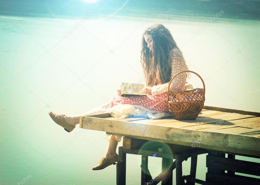 Woman reading book outdoor