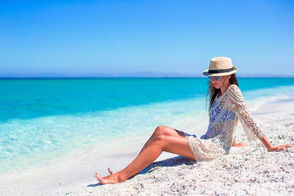 Young beautiful girl enjoying beach tropical vacation Stock Image