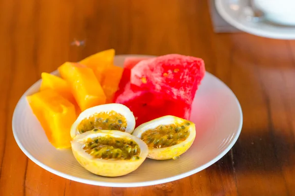 Tasty exotic fruits  on breakfast at outdoor restaraunt — Stock Photo, Image