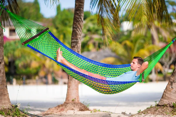 Young man relax in hammock — Stock Photo, Image