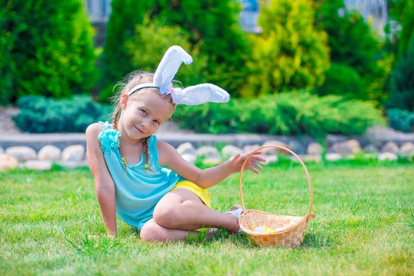 Adorable little girl wearing bunny ears on Easter — Stock Photo, Image