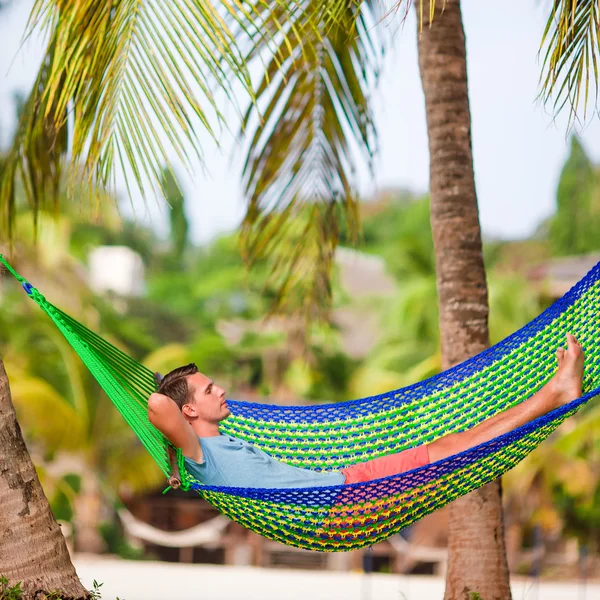 Young man relax in hammock — Stock Photo, Image