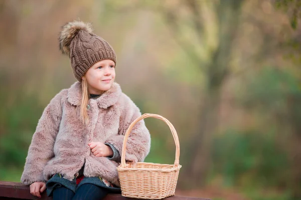 Portrait of adorable little girl outdoors at beautiful autumn day — Stock Photo, Image