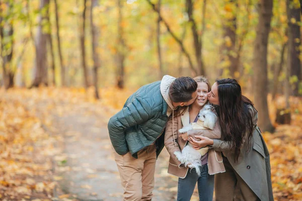 Portrait of happy family of three in autumn day — Stock Photo, Image