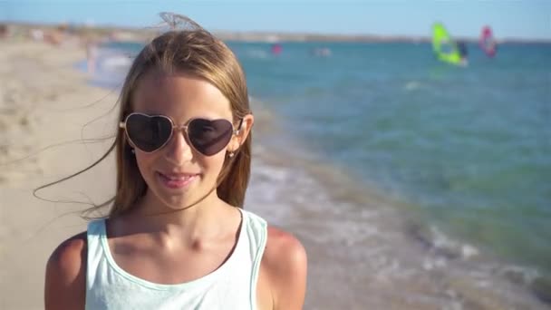 Adorable little girl at beach during summer vacation — Stock Video