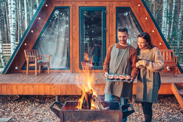 Happy family of two on the terrace in autumn — Stock Photo, Image