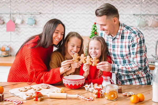 Happy family bake cookies for Christmas — Stock Photo, Image
