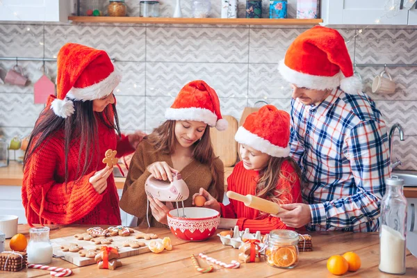 Happy family bake cookies for Christmas — Stock Photo, Image