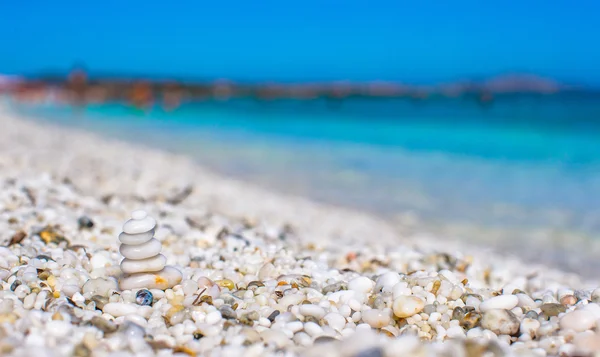 Stack of small white stones on tropical pebbles beach — Stock Photo, Image