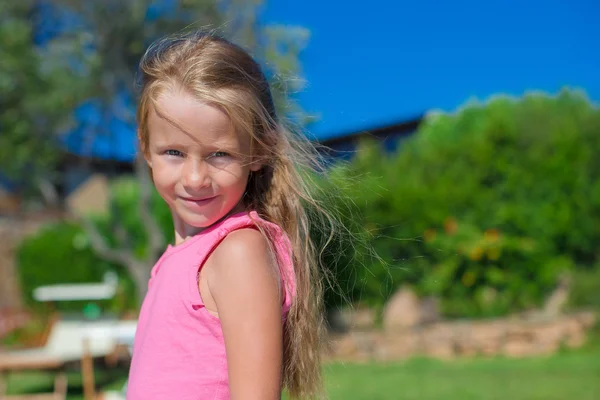 Portrait of little happy beautiful girl outdoors — Stock Photo, Image