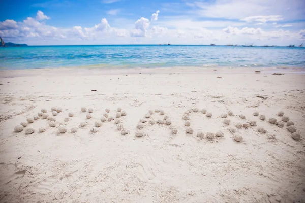 Boracay escrito en una playa tropical de arena — Foto de Stock