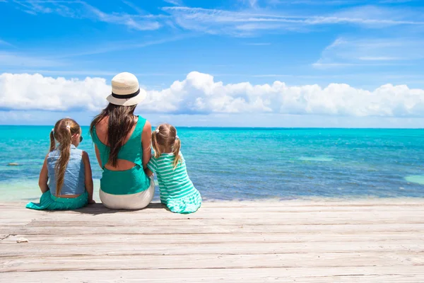 Young mother and little daughters during tropical vacation — Stock Photo, Image